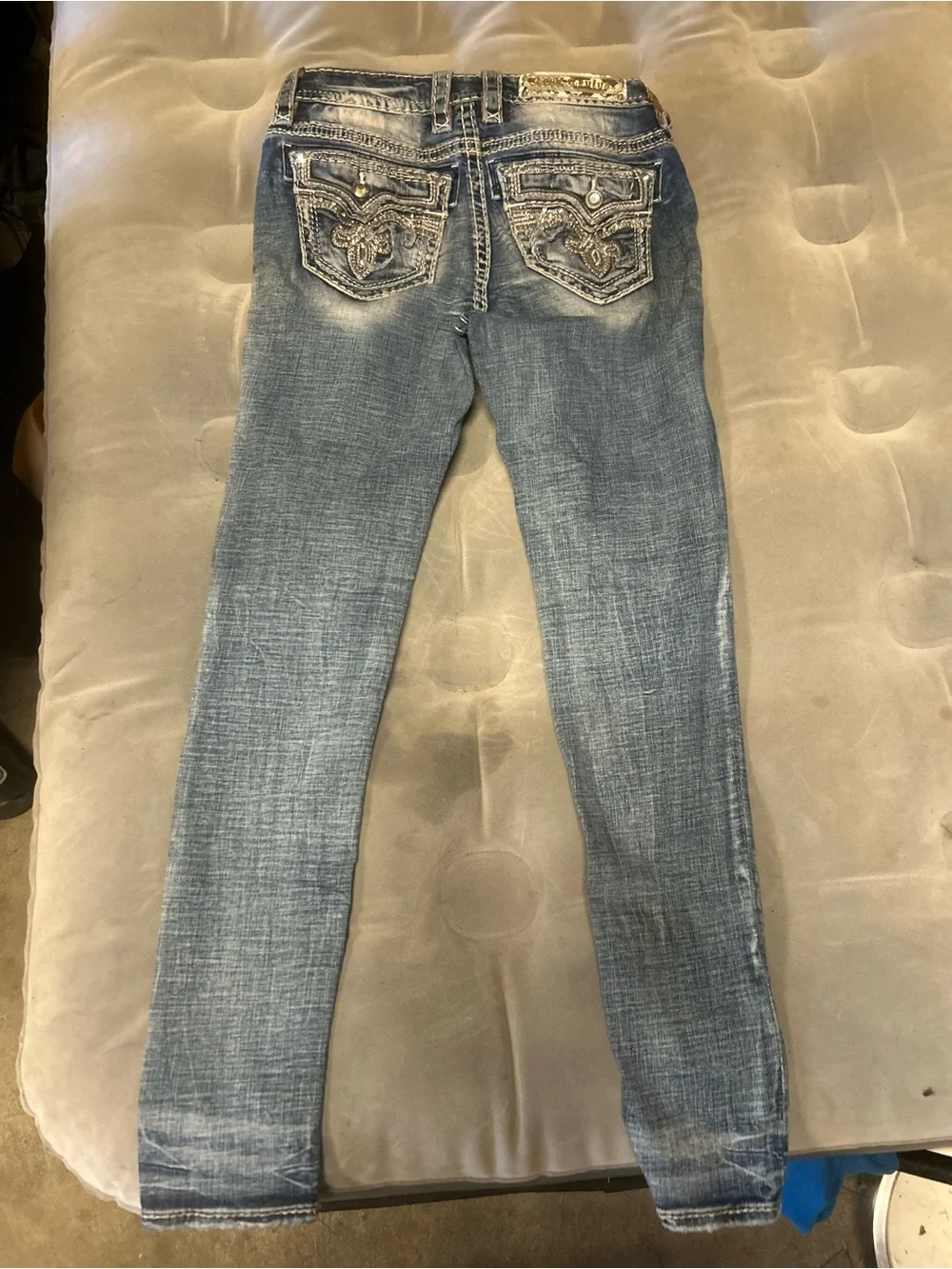 Rock Revival Women’s Skinny Jeans in Faded Blue Wash